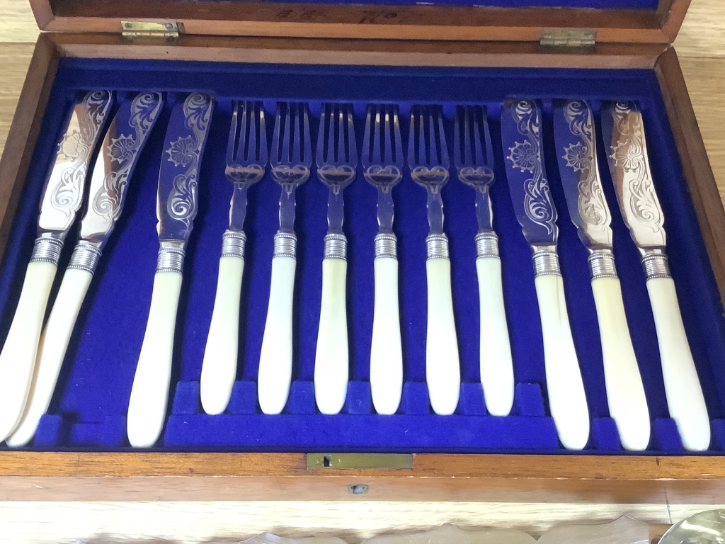 Six pairs of engraved plated fish eaters with bone handles, cased and sundry plated items